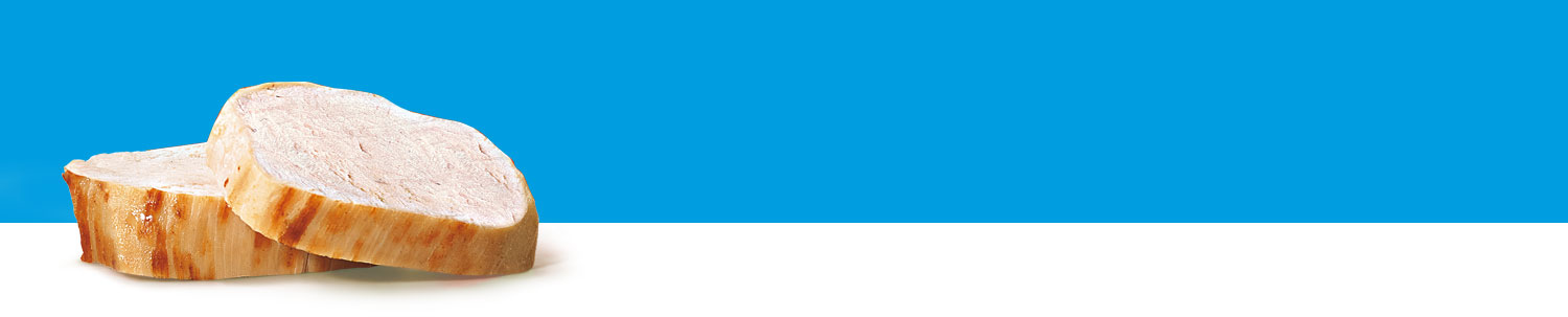 A sliced piece of bread rests on a white surface against a blue background.